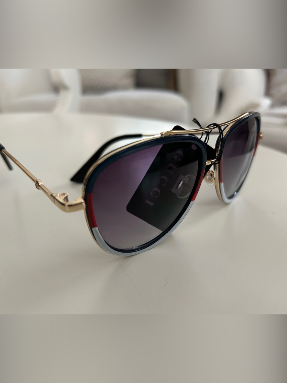 Designer-Inspired Gold Frame Sunglasses with Black and Red Accents
